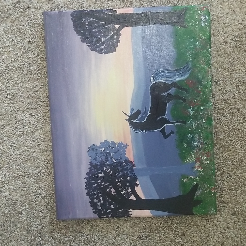 Black unicorn hand painted on canvas